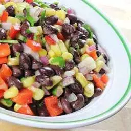 A Fresh Salad with Beans, tomatoess and Bell Pepper