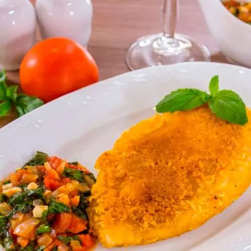 Курячі медальйони у сирному паніруванні
