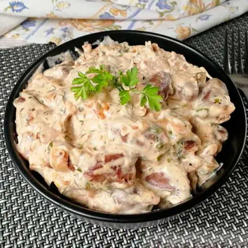 Куриные сердечки в сырном соусе