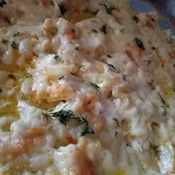 Минтай под сырной шубкой в духовке